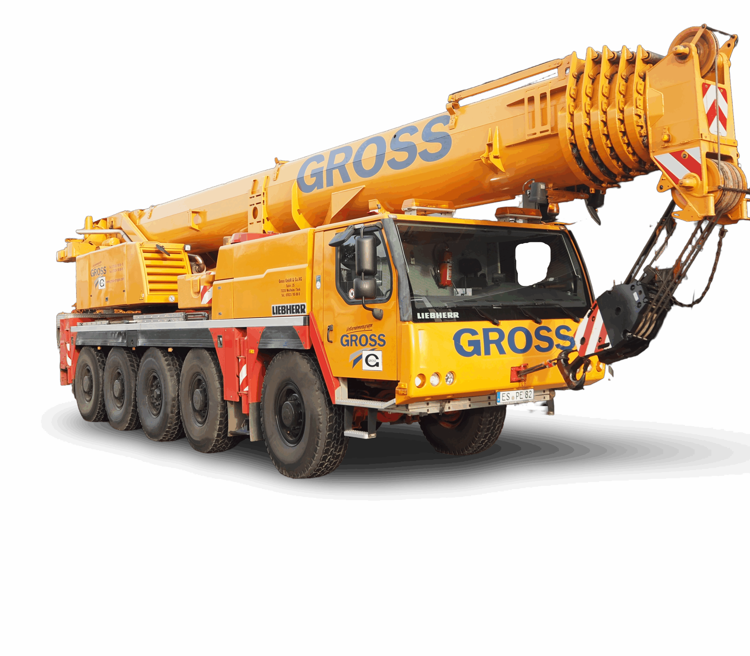 Großer mobiler Autokran in gelber Farbe mit der Aufschrift GROSS, zeigt markante Reifen und ausfahrbaren Arm.